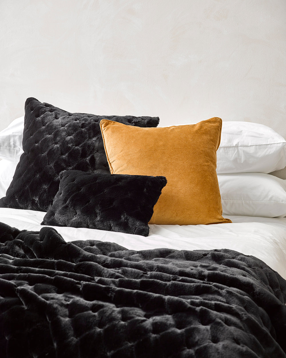 Heirloom Valentina Black Throw Rug Blanket in Faux Fur is available from Make Your House A Home Premium Stockist. Furniture Store Bendigo, Victoria. Australia Wide Delivery.