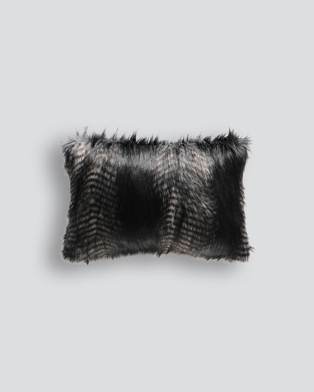 Black faux outlet fur pillow