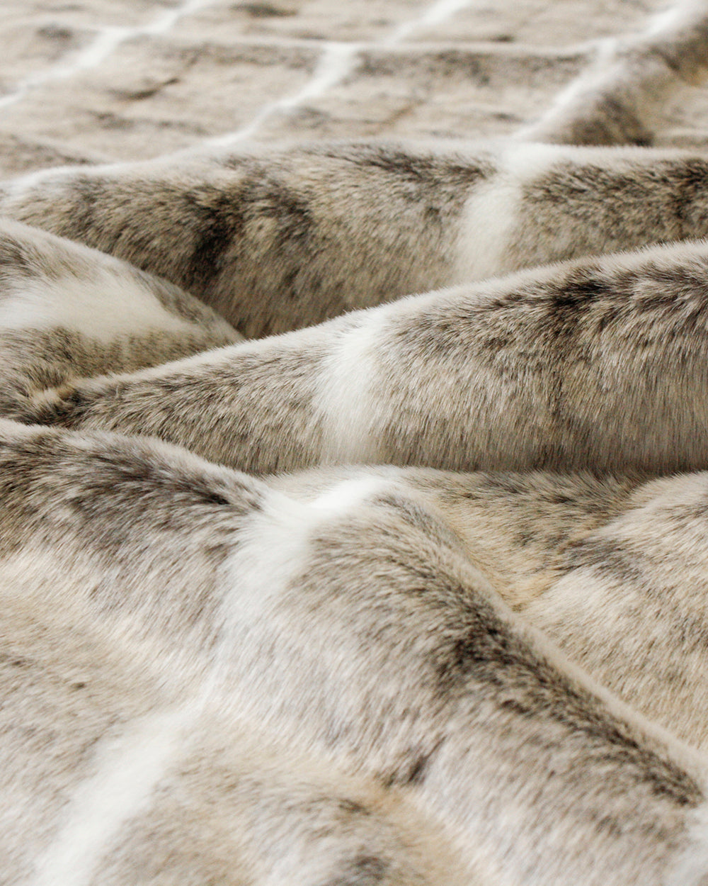 Heirloom Mountain Rabbit Throw Rug Blanket in Faux Fur is available from Make Your House A Home Premium Stockist. Furniture Store Bendigo, Victoria. Australia Wide Delivery.